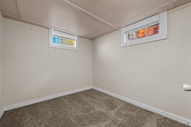 below grade area with carpet floors and baseboards