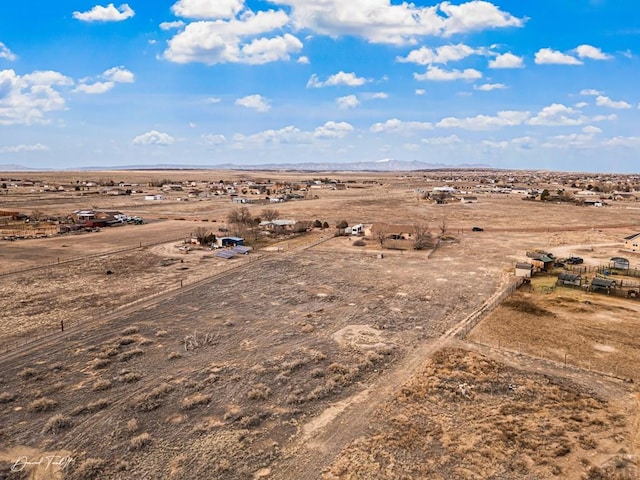 bird's eye view with a mountain view, a desert view, and a rural view