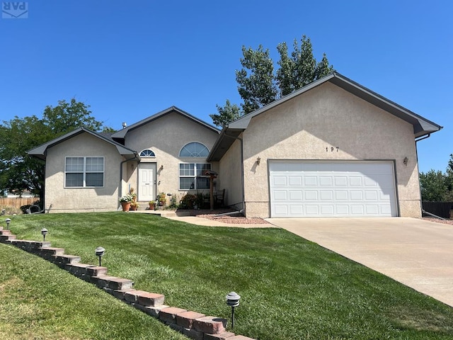 single story home with an attached garage, a front lawn, concrete driveway, and stucco siding