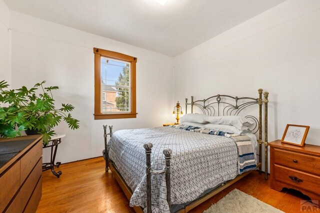 1802 E Routt Ave, Pueblo, CO 81004 - bedroom featuring wood finished floors