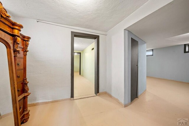 1802 E Routt Ave, Pueblo, CO 81004 - hall with a textured ceiling
