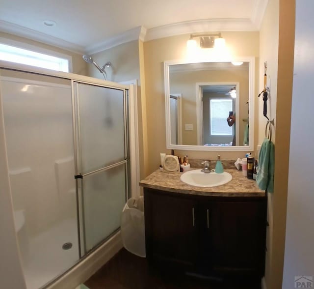 999 Fortino Blvd Unit 108, Pueblo, CO 81008 - full bathroom with crown molding, a shower stall, and vanity
