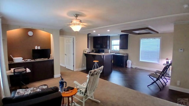 999 Fortino Blvd Unit 108, Pueblo, CO 81008 - living room with arched walkways, a ceiling fan, recessed lighting, and dark wood finished floors