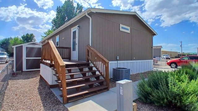 999 Fortino Blvd Unit 108, Pueblo, CO 81008 - exterior space with a shed