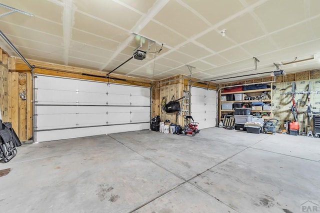 garage featuring a garage door opener