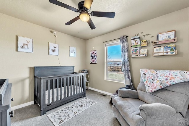 carpeted bedroom featuring visible vents, ceiling fan, and baseboards