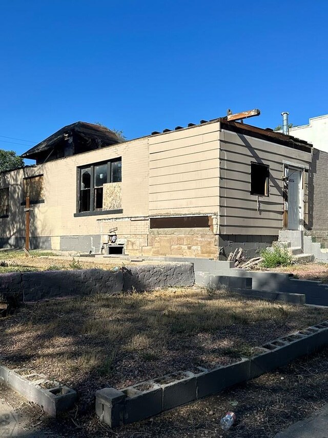 view of home's exterior featuring entry steps