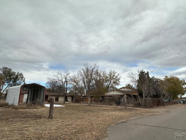 view of front of property with a carport