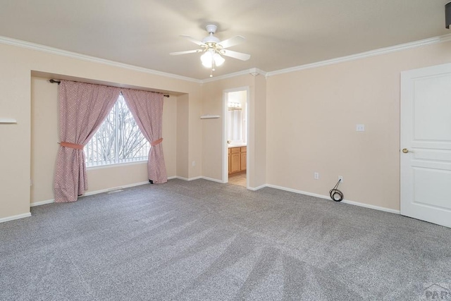 unfurnished bedroom with ceiling fan, baseboards, carpet, and ornamental molding