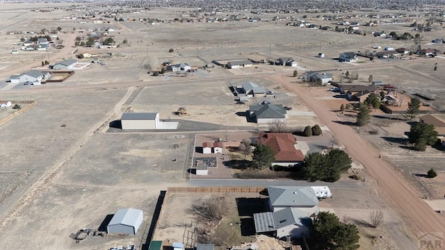 aerial view featuring a desert view