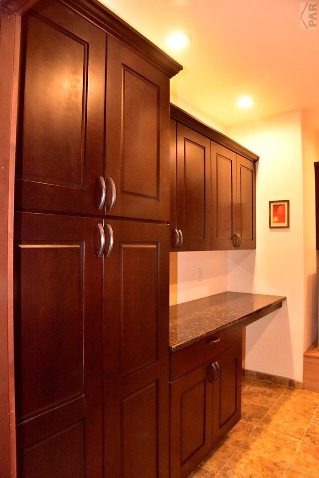 bar featuring recessed lighting and baseboards