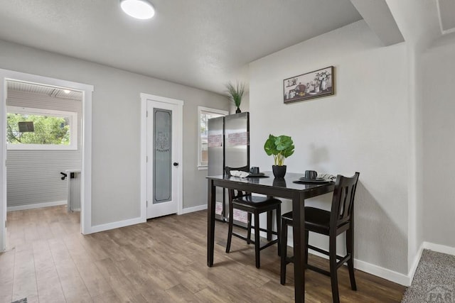 1934 E 11th St, Pueblo, CO 81001 - dining room featuring baseboards and wood finished floors