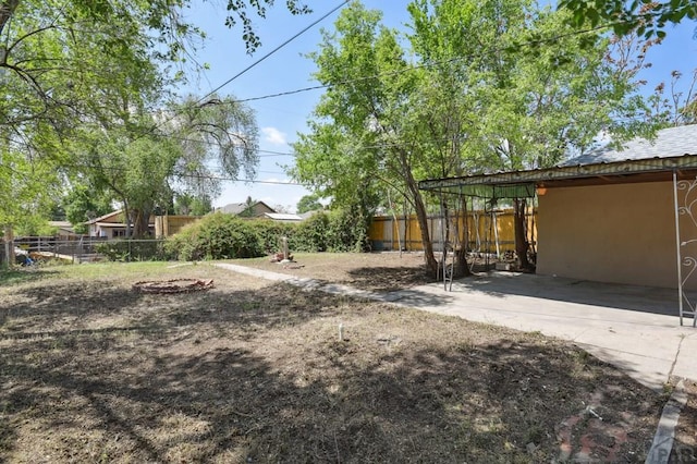 1934 E 11th St, Pueblo, CO 81001 - view of yard featuring a patio and fence