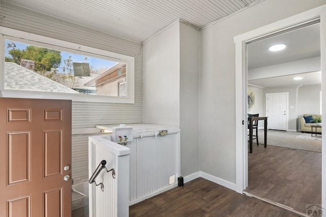 1934 E 11th St, Pueblo, CO 81001 - laundry room featuring dark wood-style floors, baseboards, and recessed lighting