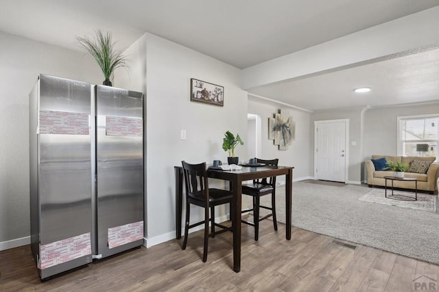 1934 E 11th St, Pueblo, CO 81001 - dining area featuring wood finished floors and baseboards