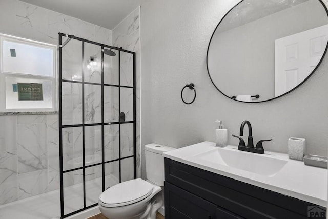 1934 E 11th St, Pueblo, CO 81001 - full bathroom with a marble finish shower, toilet, and vanity