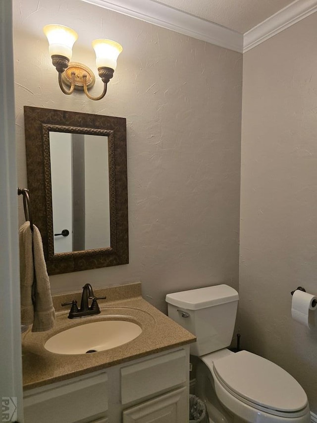 178 Macneil Pl, Pueblo, CO 81001 - bathroom featuring toilet, vanity, and crown molding