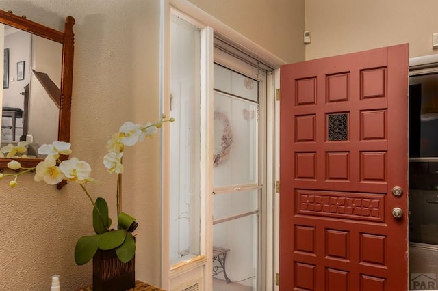 entrance to property featuring a porch