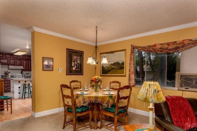dining space featuring cooling unit, light colored carpet, a textured ceiling, and crown molding