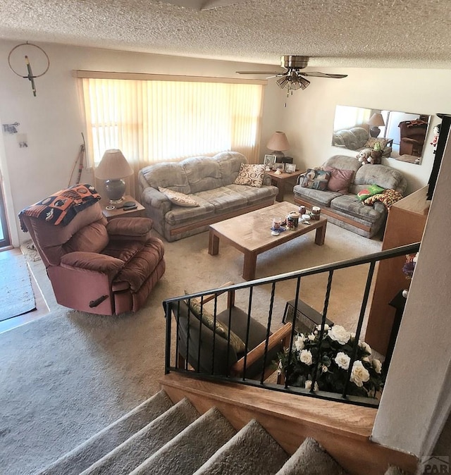 3219 Urban St, Pueblo, CO 81005 - living area featuring carpet, a textured ceiling, plenty of natural light, ceiling fan, and stairway