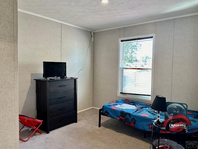 bedroom with light carpet, crown molding, and a textured ceiling