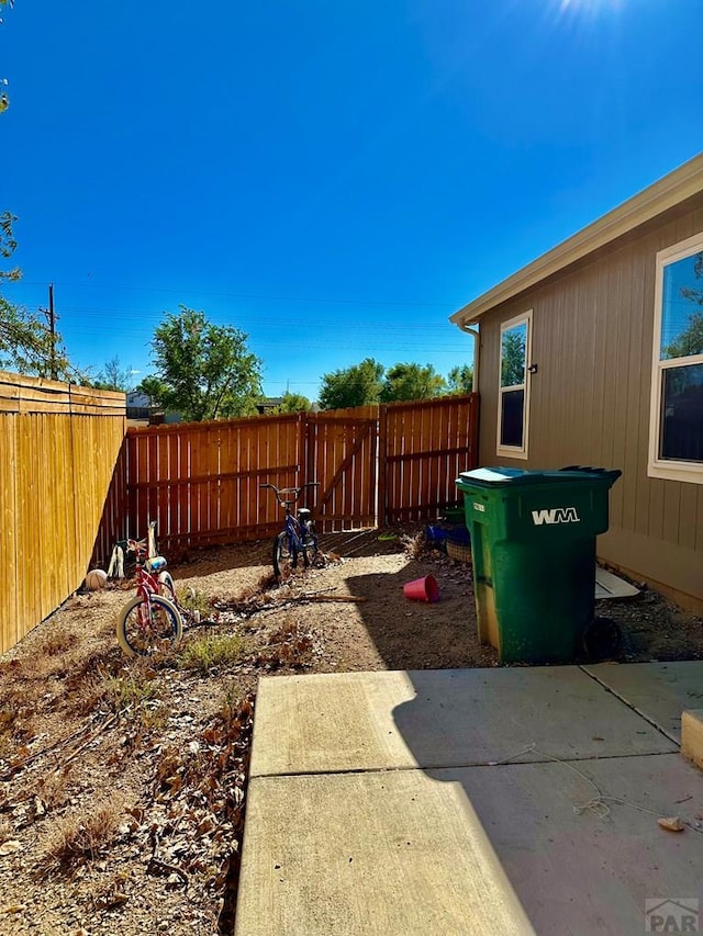 view of yard featuring a fenced backyard and a patio