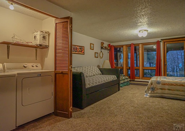 carpeted bedroom featuring a textured ceiling, baseboard heating, a closet, and washer and dryer