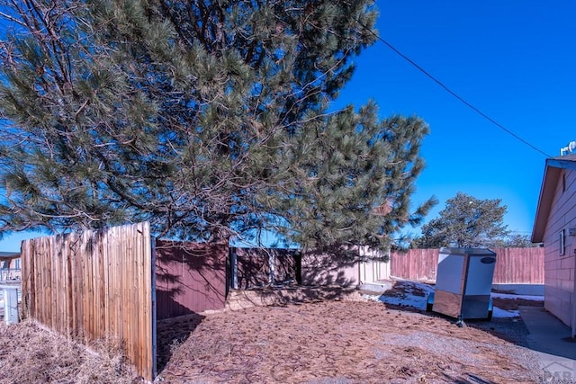 view of yard featuring a fenced backyard