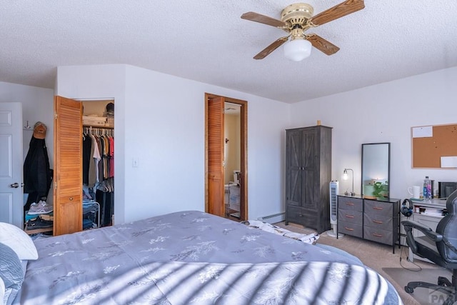 bedroom featuring a closet, a ceiling fan, a textured ceiling, and light colored carpet