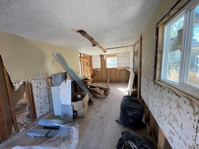 interior space with a textured ceiling