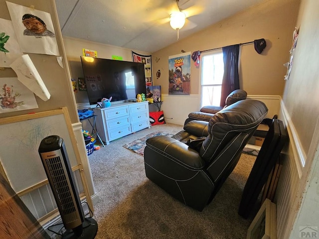 carpeted living room featuring vaulted ceiling