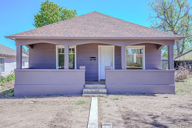 327/327.5 7th St, Walsenburg, CO 81089 - view of front of home featuring roof with shingles and covered porch
