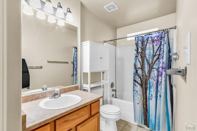 806 N Monarch Dr, Pueblo, CO 81007 - full bathroom featuring shower / bath combo, vanity, and toilet