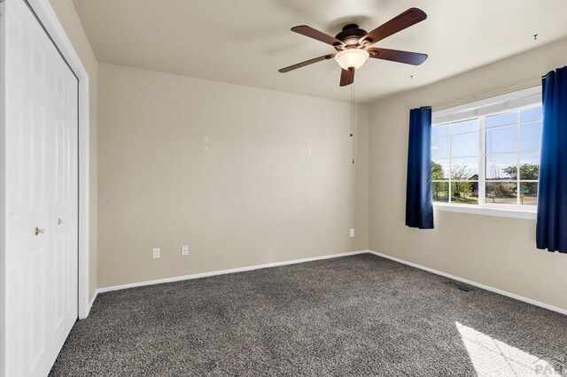 806 N Monarch Dr, Pueblo, CO 81007 - unfurnished bedroom featuring carpet floors, a closet, baseboards, and ceiling fan