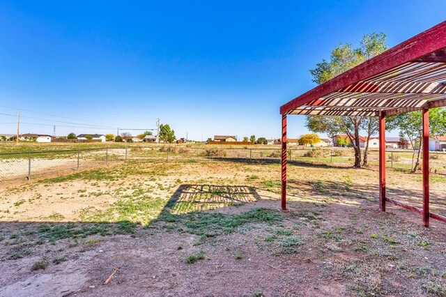 806 N Monarch Dr, Pueblo, CO 81007 - view of yard with fence and a rural view