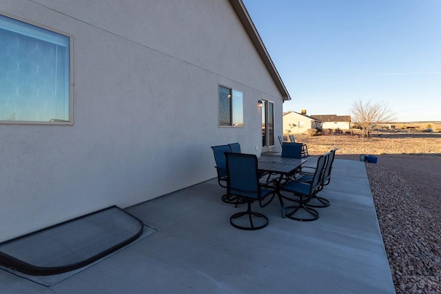 view of patio with outdoor dining area