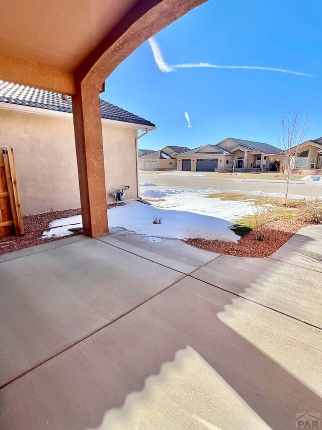 view of patio / terrace featuring a residential view