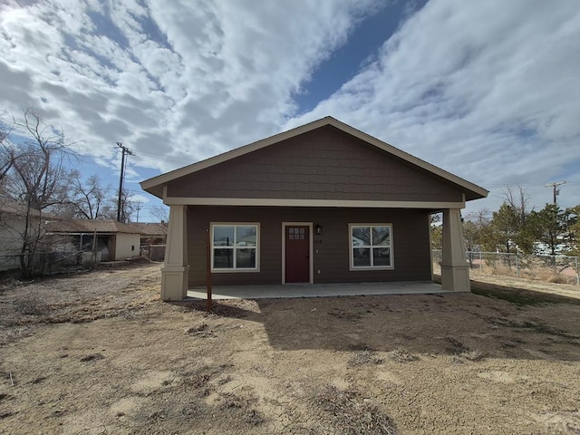 view of front of home with fence