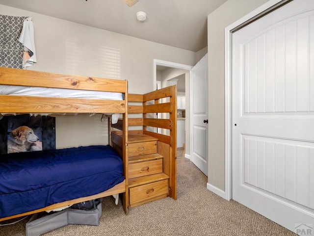 bedroom with light colored carpet