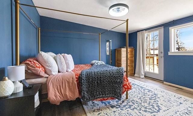 bedroom featuring wood finished floors