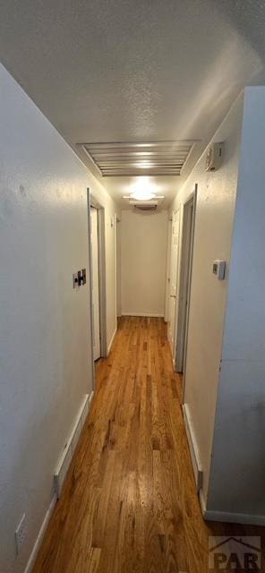 1622 Zuni Rd, Pueblo, CO 81001 - corridor featuring light wood-style floors and baseboards