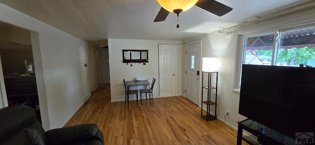 1622 Zuni Rd, Pueblo, CO 81001 - entrance foyer featuring ceiling fan, light wood-style flooring, and baseboards