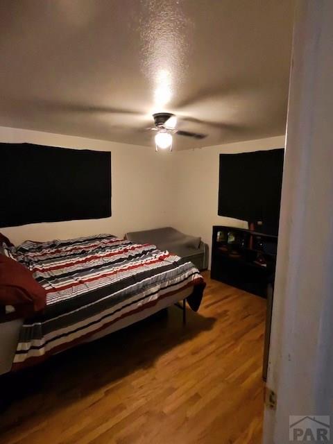 1622 Zuni Rd, Pueblo, CO 81001 - bedroom featuring light wood-style floors and a ceiling fan