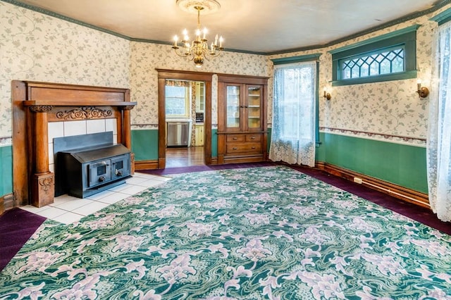interior space featuring wainscoting and wallpapered walls