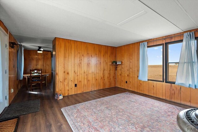 37155 E Jones Rd, Yoder, CO 80864 - interior space with wood finished floors and wood walls