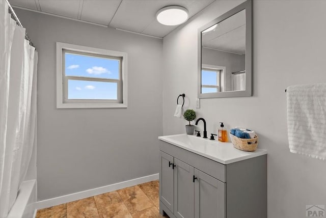 37155 E Jones Rd, Yoder, CO 80864 - bathroom featuring baseboards and vanity