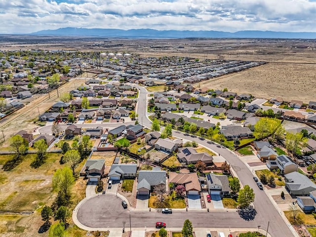 aerial view with a mountain view and a residential view