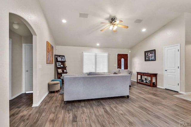 living room with recessed lighting, vaulted ceiling, ceiling fan, and wood finished floors
