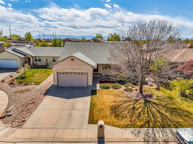 single story home featuring roof with shingles, a front lawn, driveway, a garage, and stucco siding