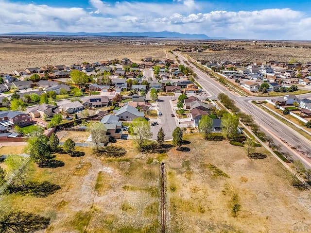 aerial view with a residential view and a mountain view